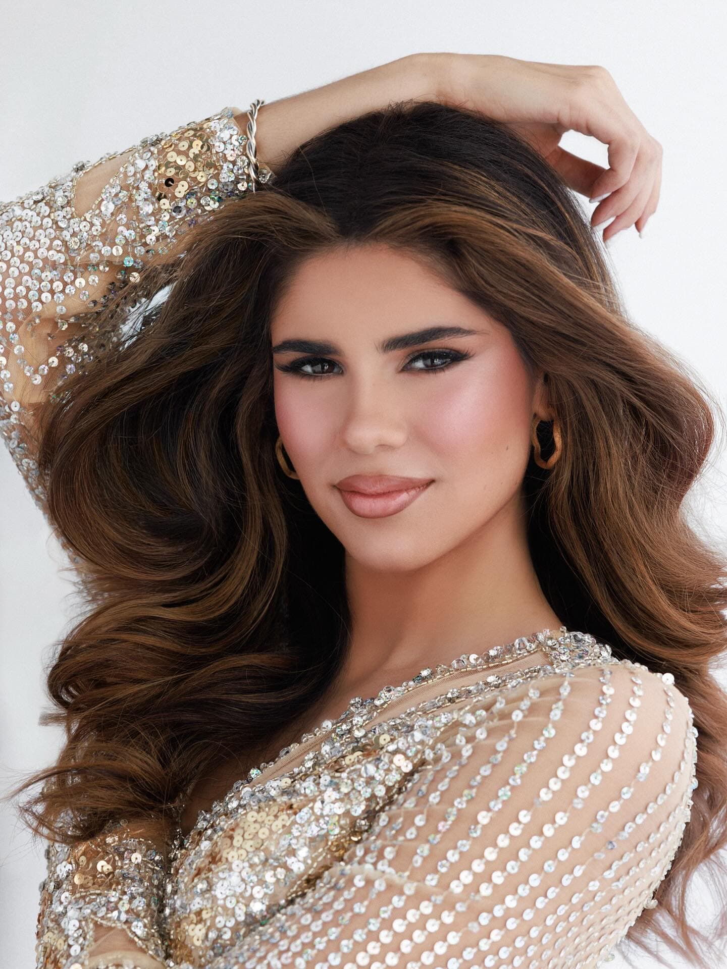 Julia Hatoum, Miss Delaware USA 2026, wearing a sequined evening gown